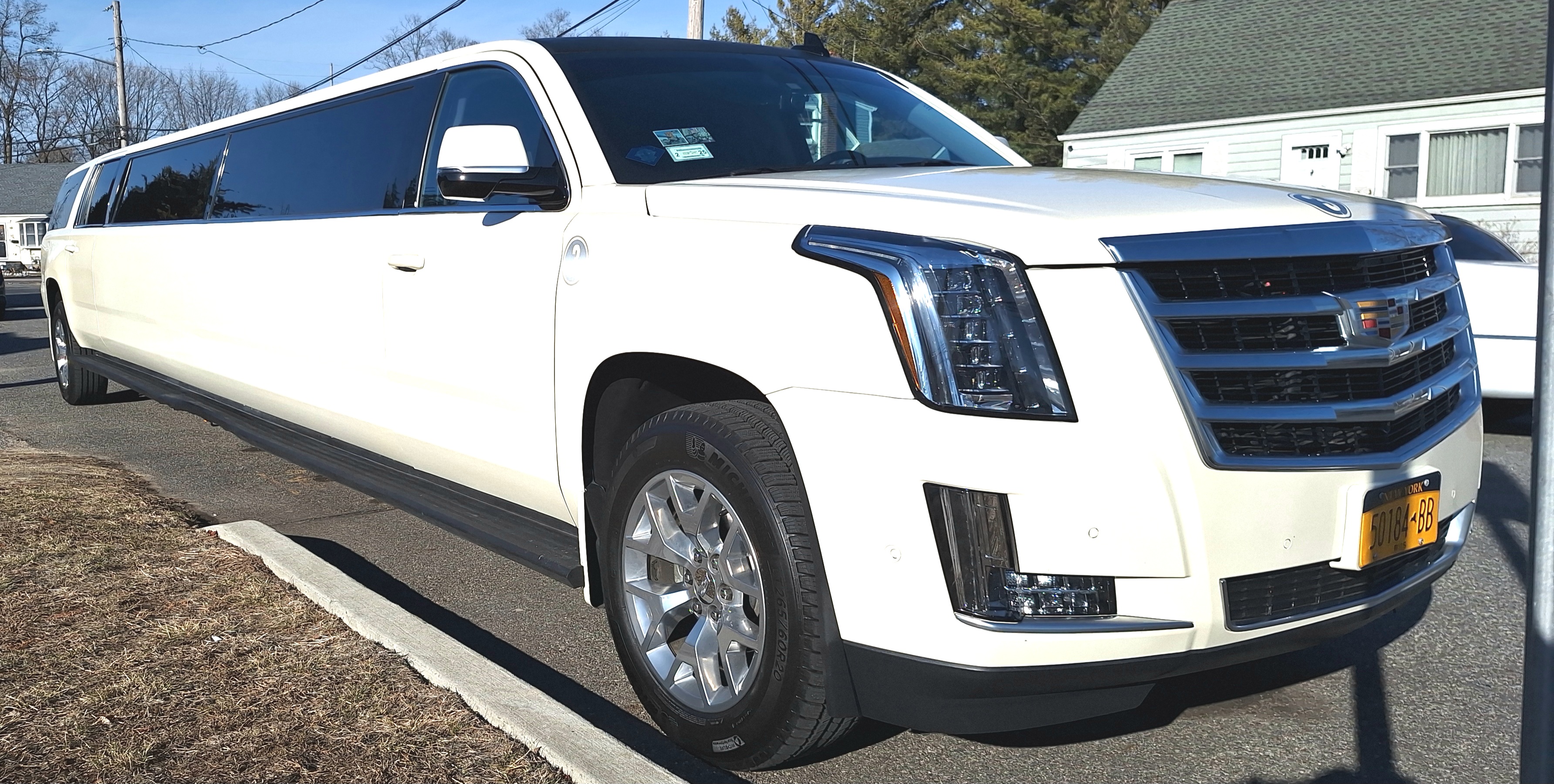 Beautiful white stretch Cadillac Escalade Limo Rental