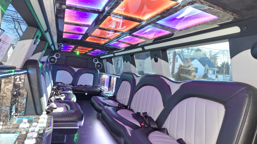 Multi-colored stretch limo Cadillac Escalade