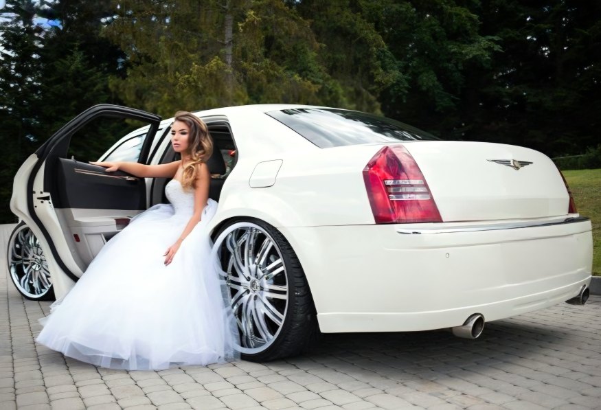 Beautiful Bride in Expensive Wedding Gown in White Bently