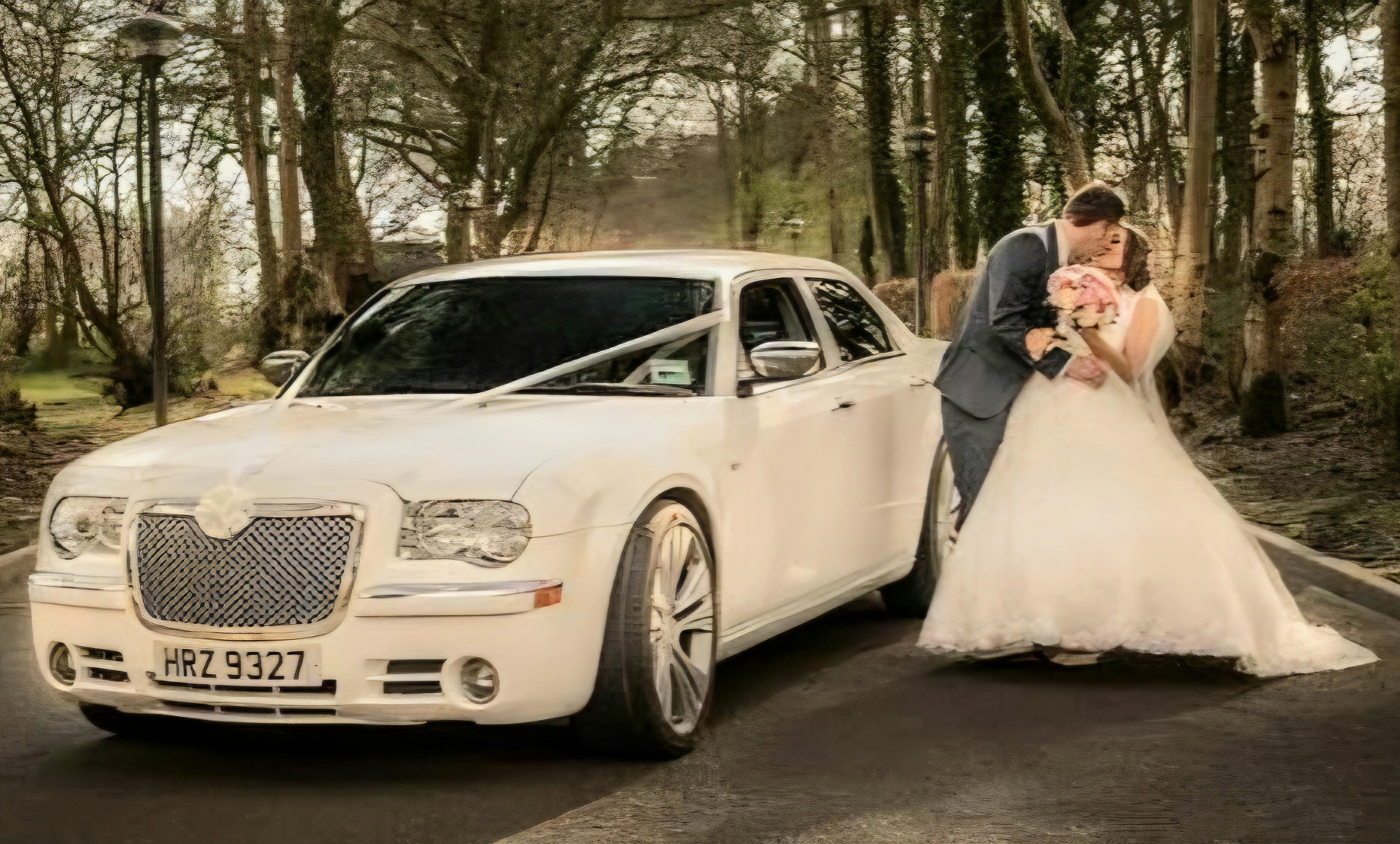 Romantic Groom Bending and holding lovely Bride in forest to the side of their luxurious Rental Bridal Car 